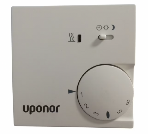 Termostaatti Uponor SPI Cosy kuvattuna edestäpäin. Analoginen termostaatti, jolal voidaan korvata vanhempi Uponor huonetermostaatti. Jännite 24V.